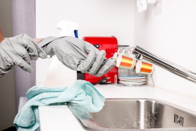 Person preparing for killing japanese knotweed with bleach