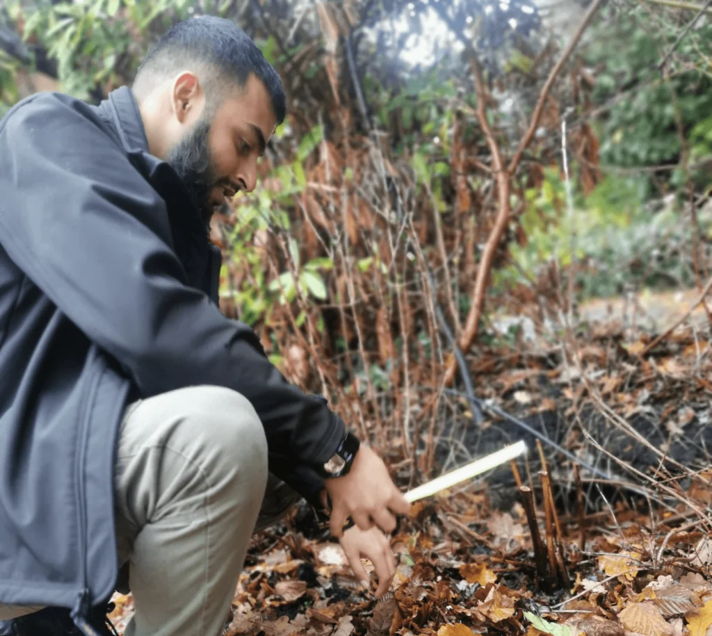 Samir looking at Bamboo canes