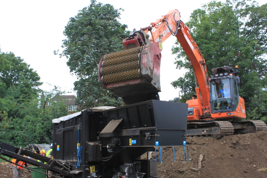 Excavator in use on development site