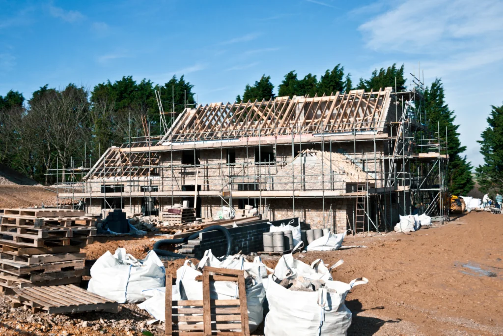 Residential construction site with house partially built